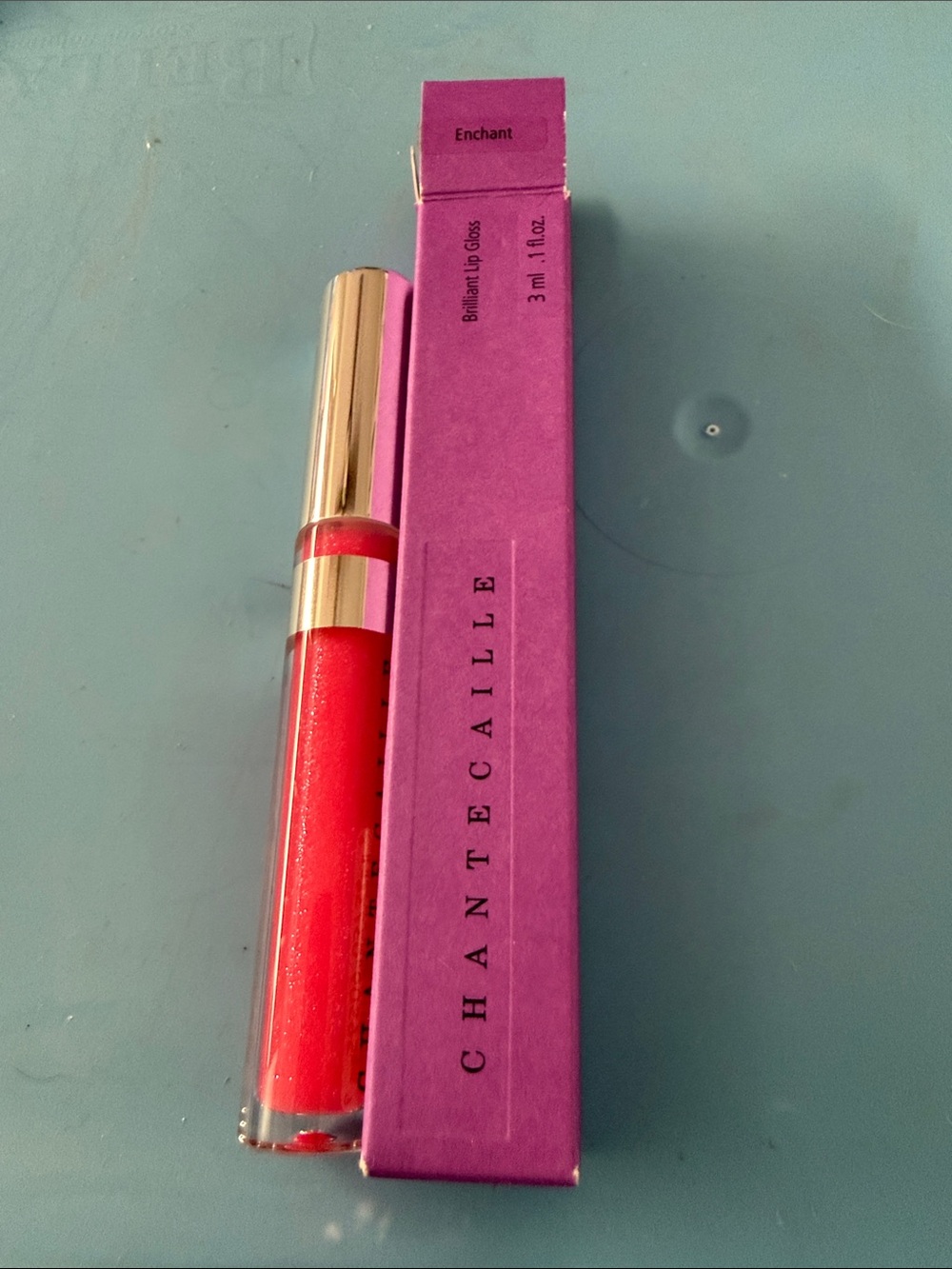 Chantecaille Enchant Lip Gloss in Bright Red